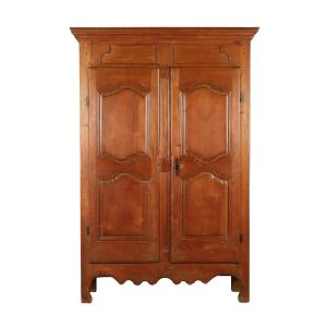 Spectacular 18th century Quebec armoire, pictured in The Early Furniture of French Canada by Jean Palardy, boasting a warm pine patina and robust construction (CA$27,140).