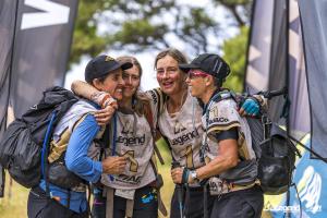 Team Mountain Designs Wild Women celebrate on the finish line at Legend XPD