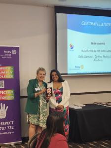 Trisha Mehta from Skill Samurai Carlingford, Receiving Pride of Workmanship Award from Christine Owen, Rotary International District Governor