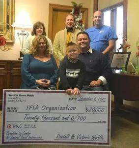 FAMILY RECEIVED CHECK BY INTFIA