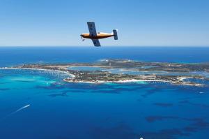 Decarbonised aircraft flying over Rottnest Island