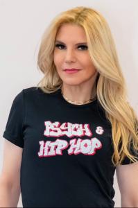 Photo of a woman wearing a t-shirt with the words "Psych + Hip Hop"