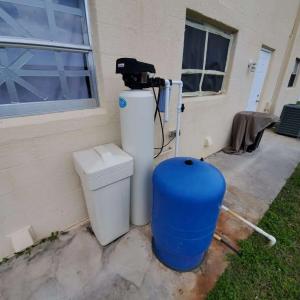 Installs home water softener