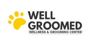 Well Groomed Pets logo with a yellow paw print