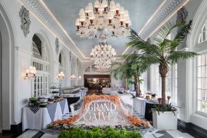 Buffet guests are welcomed with stunning ice sculpture at the entrance to the famed Grand Galvez Sunday Brunch