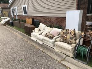 pile of junk on the curbside