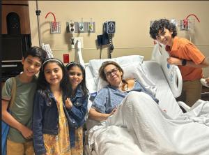 Rossa Vanessa is all smiles surrounded by family post-surgery.