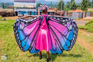 A participant showcases her butterfly attire ahead of a virtual Grand Butterfly Gathering event in Kenya. Photo: The Trueness Project.