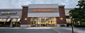 Outside of Mattress Warehouse of Acworth, located next to Panera Bread