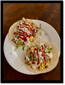 Delicious pork tacos with fresh toppings, made with premium quality meat from Laxson Provisions