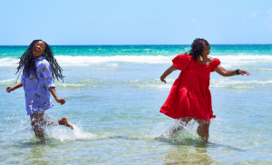 Loc Girls Having Fun on the Beach