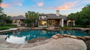 Resort-style pool and hot tub, plus sandy lakeside beach