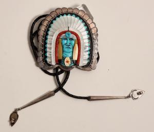 Zuni bolo by Danny Young, signed on the reverse, with custom silver work by Savage, circa 1975, 203 grams, one of the finest Zuni bolo artisan pieces of its time (est. $7,000-$15,000).