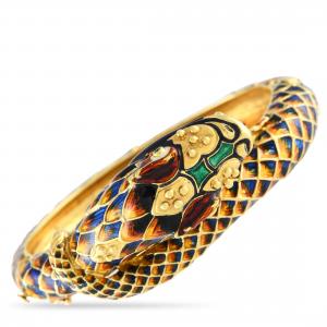 Bold 18kt yellow gold mythical dragon bracelet, meticulously detailed with blue, amber, green and black enamel, with gemstones for eyes, in a gift box (est. $6,500-$15,000).