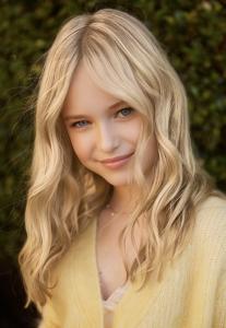 Image of Karelina Thomas blonde hair and blue eyes and is working to help children in a crisis situation have a better experience