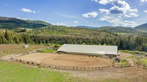 Working equestrian destination and regulation riding arena