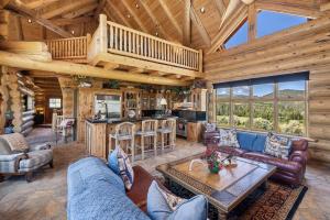 Luxury lodge aesthetic with natural stone and hardwoods