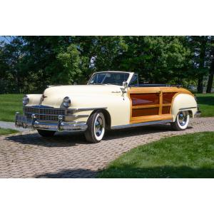 Lemon yellow 1948 Chrysler Town & Country convertible car with stunning wood features, an American-made beauty and one of only 8,809 units produced (est. CA$85,000-$110,000).