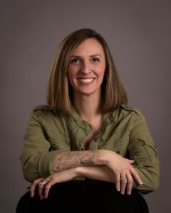 Clarissa Moll author poses as part of promotion of her new book, " Hurt Help Hope: A Real Conversation about Teen Grief and Life After Loss"
