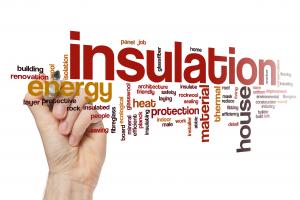 Blowing insulation into an attic.