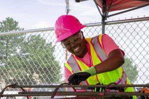 Siona is working with steel with all her safety gear