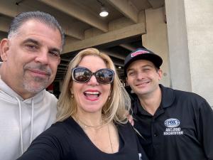 Photo of two men and a woman promoting a pre-game VIP event