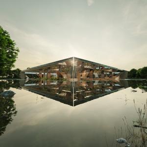 Exterior view of the Periscope House, showcasing its retractable mirrors that bring natural light into the subterranean dwelling.