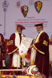 Shri Savjibhai Dholakia, Founder and Chairman of Hari Krishna Exports and the Dholakia Foundation, was honoured with an Honorary Doctorate in Science by Pravara Institute of Medical Sciences (PIMS) Deemed University, Shirdi, during their 18th Convocation Ceremony with the hands of Honorable Shri C A momentous occasion: Dr. Savji Dholakia is awarded an honorary doctorate by the Honorable Governor of Maharashtra at PIMS's 18th Convocation Ceremony.