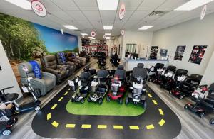 Photo of the Inside the Mobility City of Rogers showroom with its range of mobility equipment and signature test track for trying equipment before you buy it.
