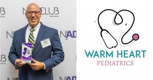 A photo of Michael Maloney holding the first place trophy seen next to the Warm Heart Pediatrics logo design
