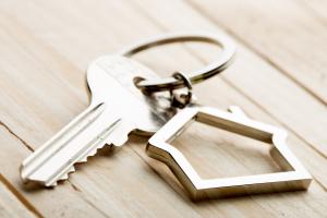 Key and house key-ring, as giving the key of your home to a home exchange partner