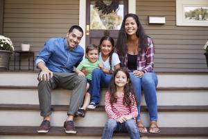 Happy family during a home exchange- People Like Us website banner image