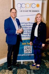 Ed Katz with Gold Coast PR Council Award and presenter Judy Joffe