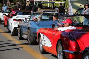 a line of vintage Corvettes