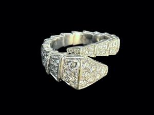 A Bvlgari 18K white gold and pave diamonds Serpenti viper ring more than doubled its high estimate to finish at $11,685; an Hermes Ebene Clemence Birkin 42 shoulder bag realized $8,610; and a men’s Rolex Sea-Dweller Deep Sea wristwatch rang up $6,765 in Neue Auctions’ online-only Property of a Gentleman auction held on October 18th Dazzling Bvlgari Serpenti viper ring, one coil, in 18K white gold boasting 1.74 carats of brilliant-cut pave diamonds, weighing 9 grams, size 10, with the original boxes ($11,685).