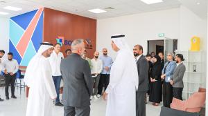 Sheikh Khalid Al Mualla with Dr Hisham Safadi and Mr Johnson George
