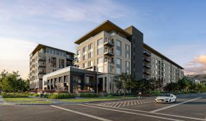 Rendering of the new, modern Gables Library Square multifamily apartment complex. Located on the east side of downtown Salt Lake City with sweeping views of the Wasatch mountains, the complex's exterior features modern design in tans and greys and consist