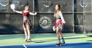 Soul Bandit Pickleball Pirate Themed Brand Launches showing two women players on court wearing roller skates