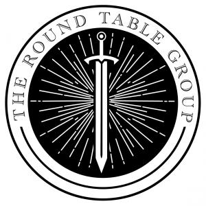 Black and white logo of The Round Table Group featuring a central sword and radiant lines, symbolizing expertise in marketing and brand consultancy for the hospitality and entertainment sectors in South Florida.