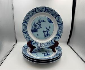 Set of four Limoges (France) Charles Field Haviland Cerisieres de Monet service plates with a nice blue and white cherry trees design (est. $750-$800).