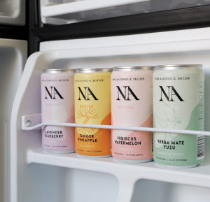 Image of four NA cans in a fridge: Discover our range of Functional Mocktails, where refreshing flavors meet wellness benefits.