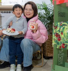 Family enjoying upcycled ugly fruit activity