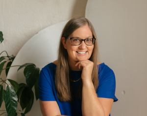 Image of Dr. Kate Williams looking at camera and smiling