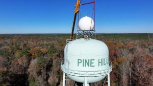 Climavision's X-band radar sits atop a water tower after being installed in Pine Hill, Alabama