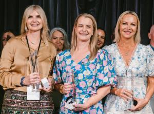 Caroline Hope Light, Katy Genc, and Jodie Holland proudly receiving their 50K Club awards at Prosperity Of Life's Super Saturday seminar in Melbourne.