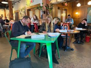 Participants filling out their account-based marketing workbook at a previous workshop in Milwaukee.