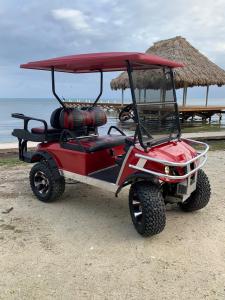 Golf cart on the Beach of San Pedro Town, Belize