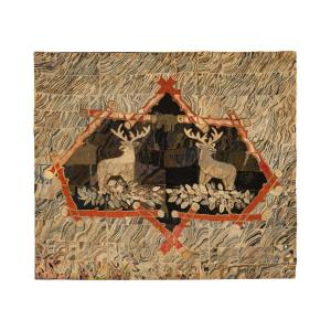 Adirondack-style hooked rug with a large central image of two stags facing out with their heads turned, made in Quebec circa 1890-1920, 96 inches by 84 inches (est. CA$12,000-$15,000).