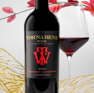  Tornabene Cabernet Sauvignon: A bottle of Tornabene Wine 2022 Cabernet Sauvignon, an award-winning red wine with a velvety smooth finish, displayed elegantly with rich, dark hues.