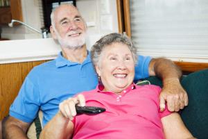 Older couple watching TV